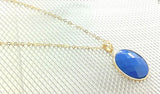 Collier plaqué or avec médaillon bleu pendentif